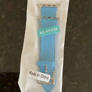 Brand new, never opened blue leather Apple Watch band with silver hardware